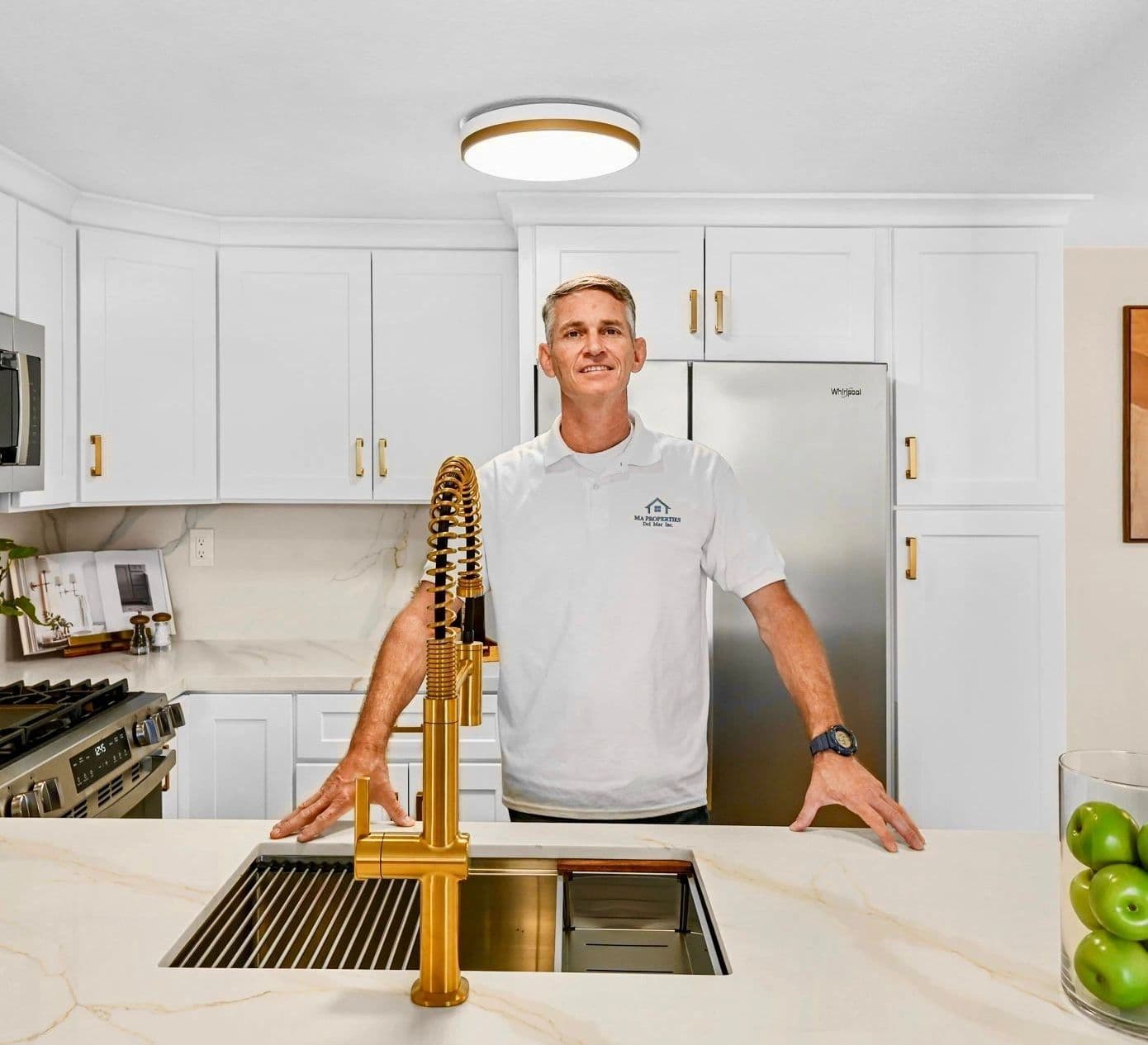 Gustavo Mello, owner of MA Properties, in a completed Del Mar kitchen remodel